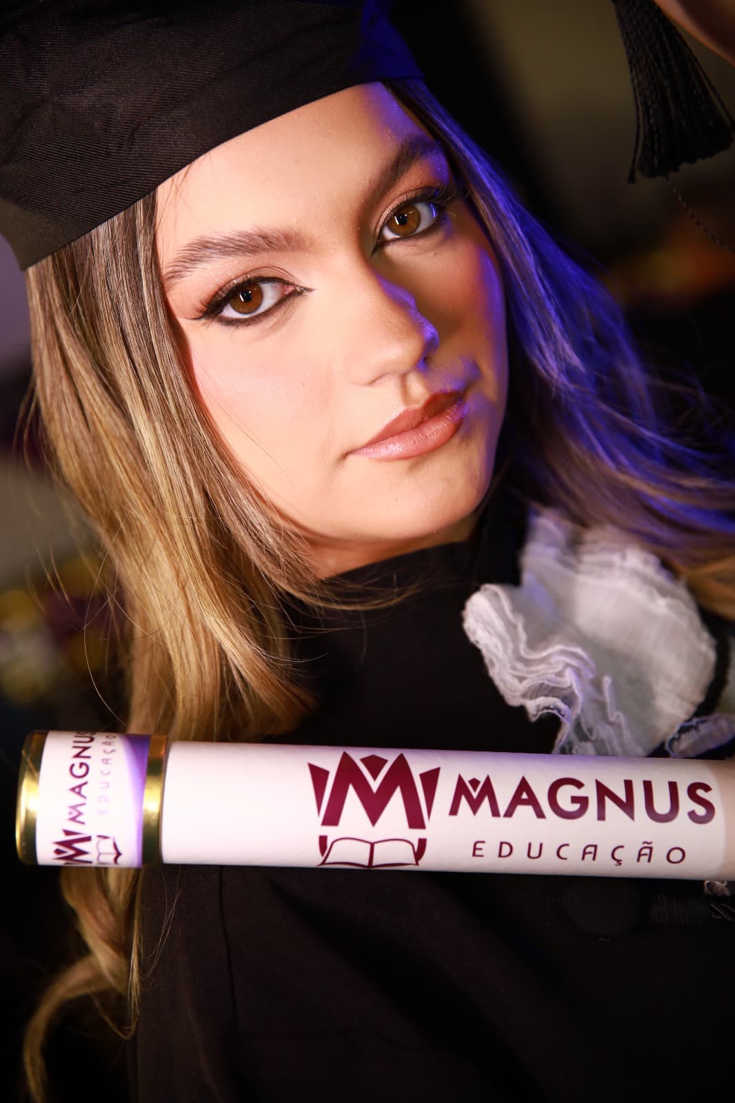 O diploma na mão